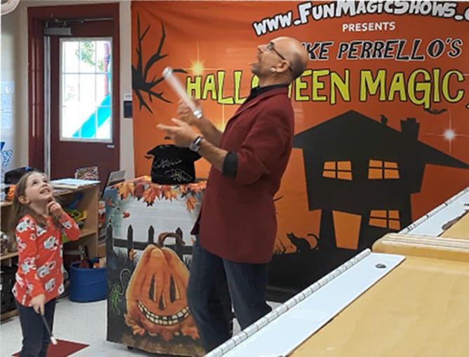 Kids enjoying Halloween magic