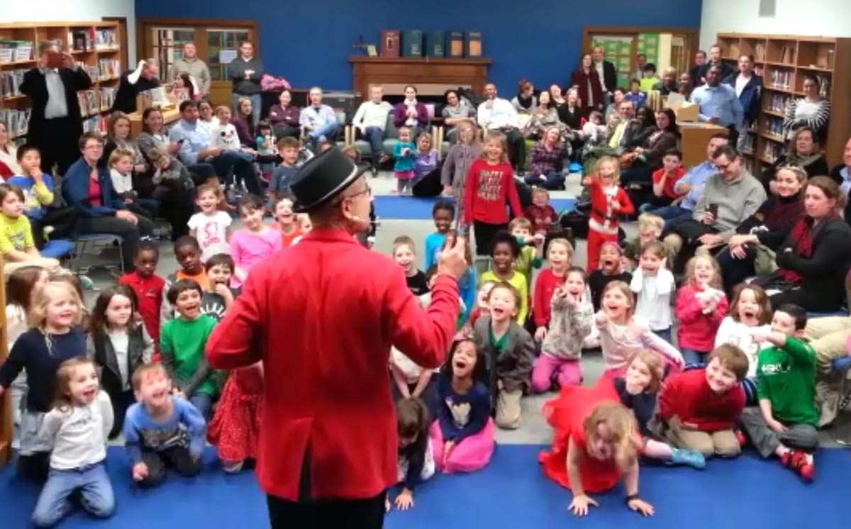 Mike Perrello performing for kids